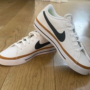 Nike White Sneakers with Black Swoosh and Tan Detail